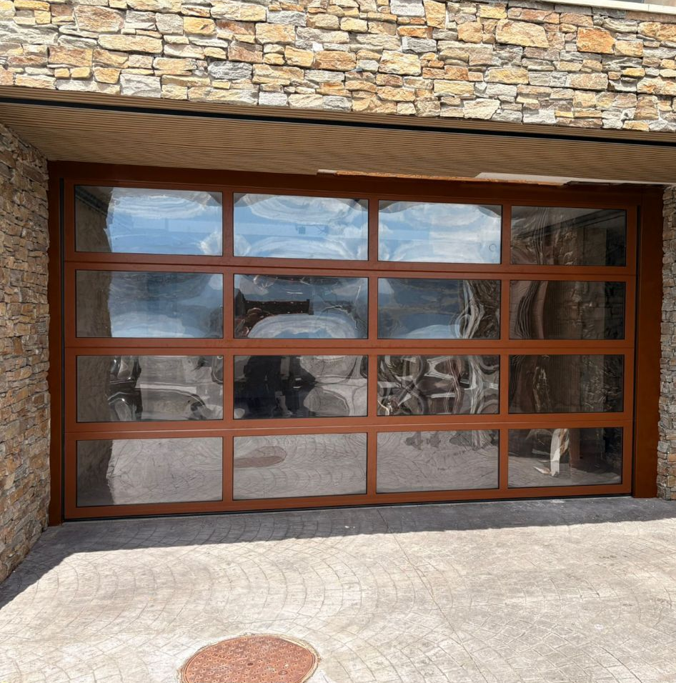 Puerta garaje aluminio y metacrilato